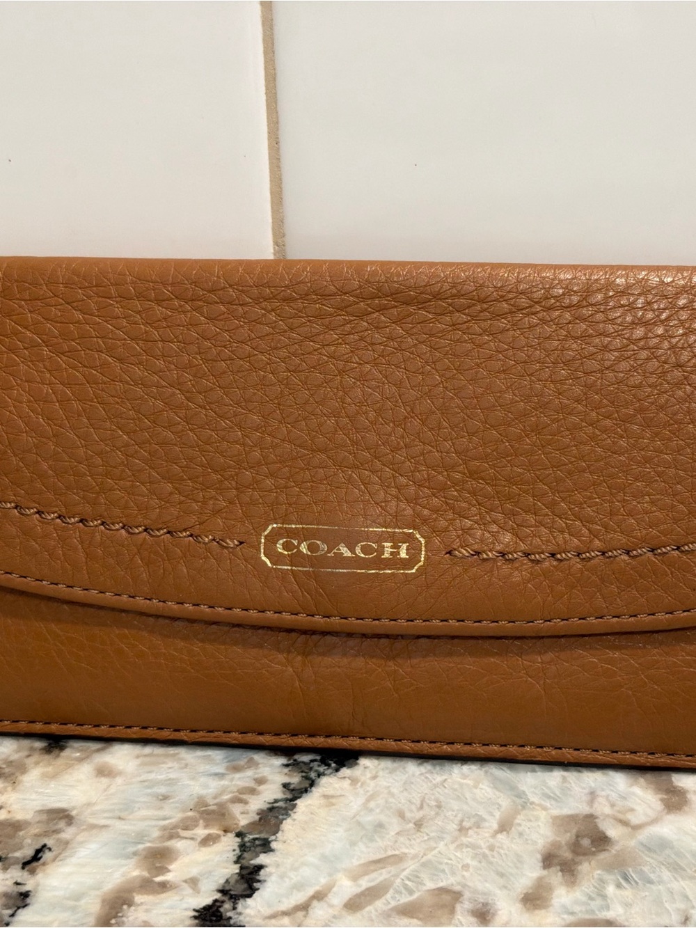 Coach Brown Pebbled Leather Fold-Over Wallet with Gold Logo